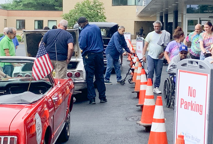 Classic cars and patients at New Bridge Medical, 2025