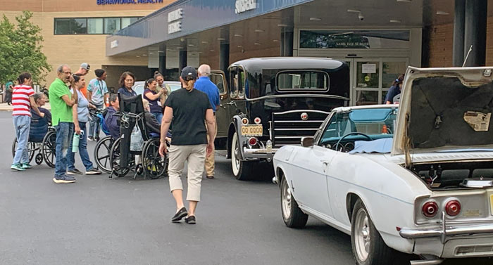 Restored Rusty Relics car club visit to medical center